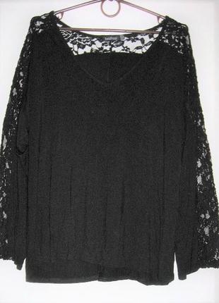 Черная трикотажная блуза с кружевными вставками1 фото