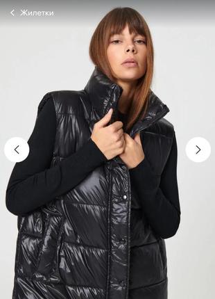 Черный удлиненный стеганый жилет oversize sinsay