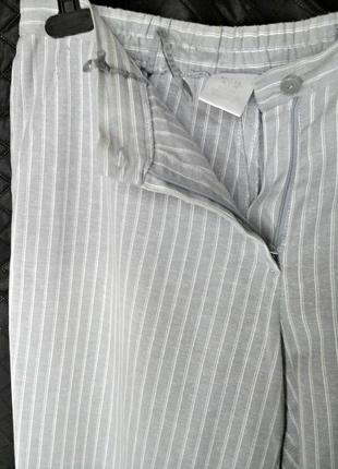 Элегантные полосатые брюки из ткани со льном6 фото