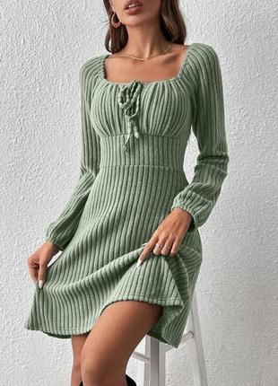 Трикотажное женственное платье мини короткая с длинными рукавами и завязками на груди мустанг1 фото