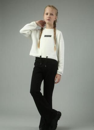 Теплі брюки кльош на флісі