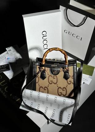 Гарна жіноча сумка gucci на довгому ремінці з двома ручками люксова модель