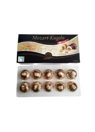 Конфеты шоколадные mozart kugeln от henry lambertz 200 гр марципан в черном шоколаде3 фото