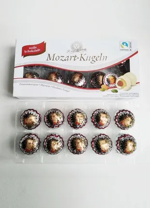 Конфеты в белом шоколаде mozart kugeln от henry lambertz 200 гр марципан1 фото