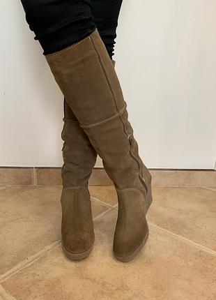 Теплі високі жіночі чоботи