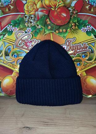 Вязаная теплая зимняя шапочка  
с отворотом на микрофлисе
,цвет темно-синий1 фото