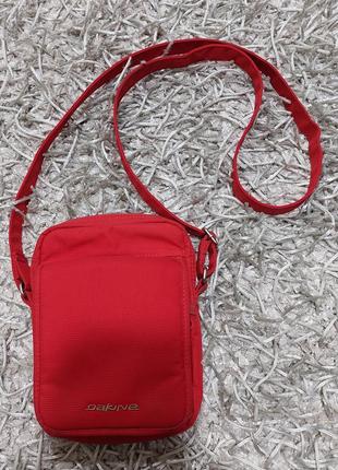 Шикарная вместительная женская сумочка через плече от dakine.10 фото