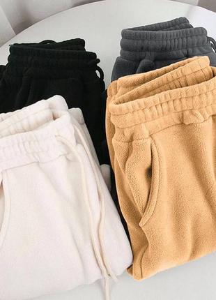 Теплые брюки на флисе женские с манжетами3 фото