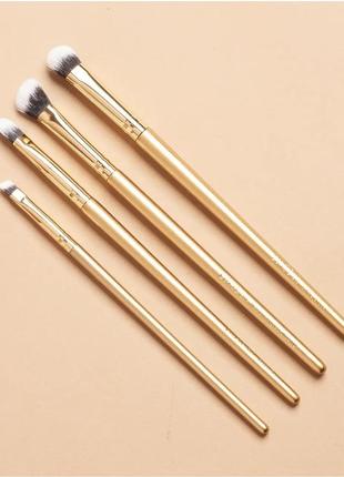 Набір з 8 пензлів для макіяжу  luxie glitter and gold brush set7 фото