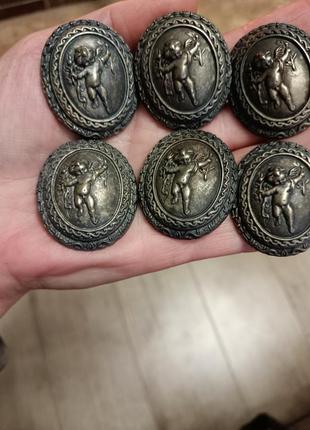 Металлические пуговицы