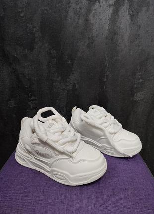 Кросівки білі7 фото