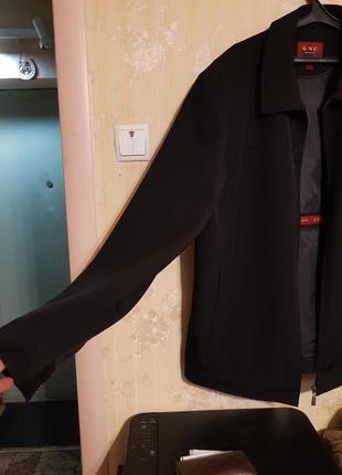 Стильная демисезонная куртка для мужчин черного цвета2 фото