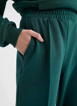 Женские темно-зеленые спортивные штаны defacto9 фото