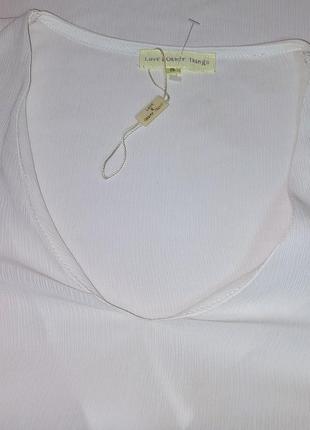 Стильная блузка белого цвета с разрезами на рукавах love & other things, молниеносная отправка7 фото