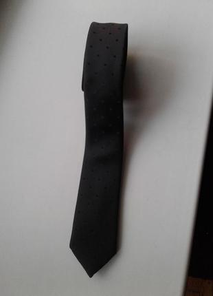 Узкий черный блестящий женский галстук с атласными квадратиками с люрексом