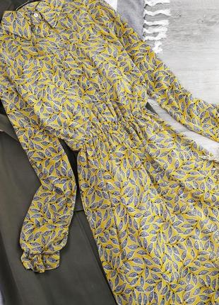 Платье миди в необычной расцветке желтое с принтом2 фото