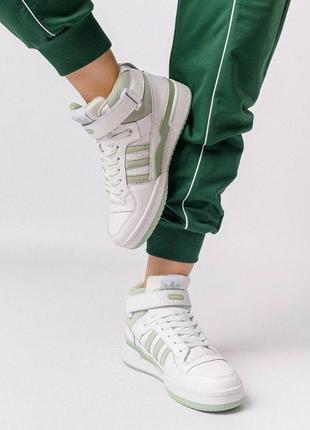 Зимові жіночі кросівки adidas originals forum 84 high white olive fur2 фото