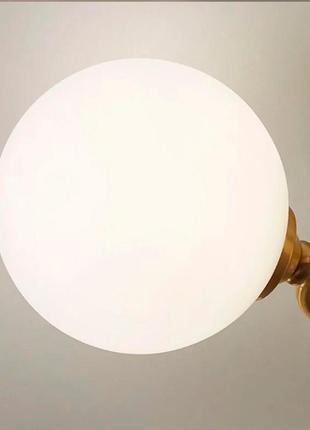 Стельова люстра в латунному корпусі з вигнутими ріжками на 6 ламп3 фото