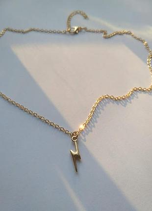 Кулон мітка гаррі поттера золота блискавка.