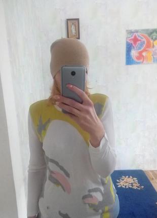 Стильная золотая шапка oggi. 3