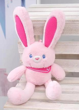 Розвиваючі іграшки для дітей м'яка іграшка кролик плюшевий потягни за вушка рожевий