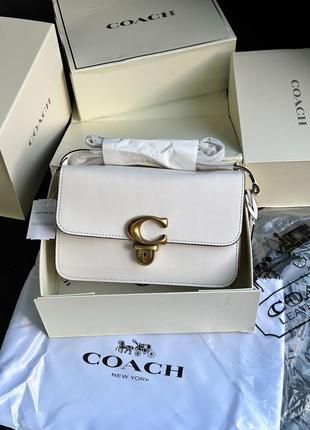 Кожаная сумка coach