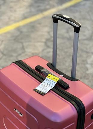 Качественный чемодан, с абс пластика,противноударный,на 4 колеса,е кодовый замок9 фото