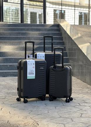 Якісна валіза з абс пластику ,надійна ,противоударна ,подвійні 4 колеса ,кодовий замок5 фото