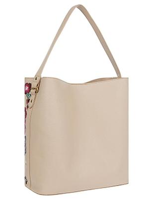 Шкіряна сумка з красивою вишивкою3 фото