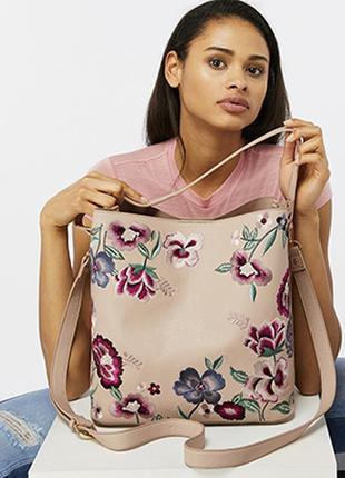 Шкіряна сумка з красивою вишивкою4 фото