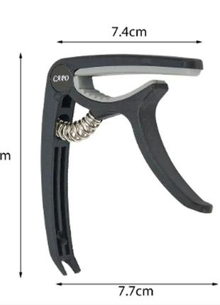 Универсальный каподастр для акустической гитары, электрогитары, банджо, мандолины и укулеле6 фото