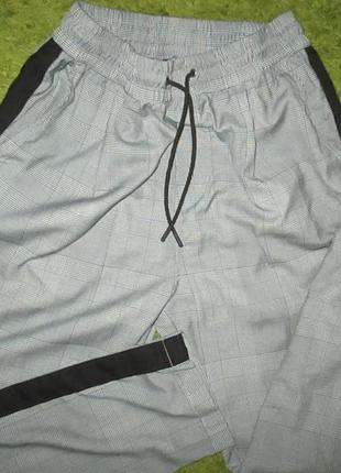 Новые не длинные с лампасами брюки на резинке,талия:полуобхват36-42см1 фото