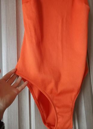Слитный оранжевый купальник в рубчик французского бренда etam l4 фото