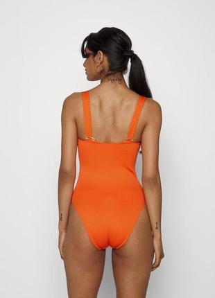 Слитный оранжевый купальник в рубчик французского бренда etam l7 фото
