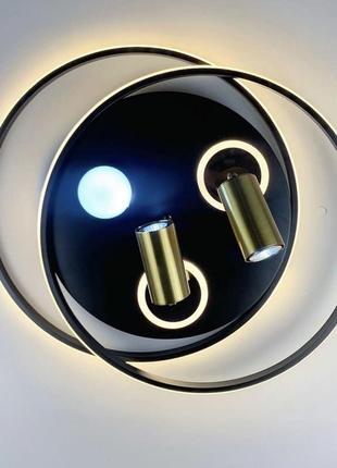 Стельовий світильник із золотистими спотами.5 фото