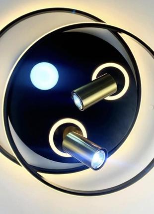 Стельовий світильник із золотистими спотами.6 фото