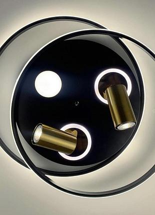 Стельовий світильник із золотистими спотами.3 фото