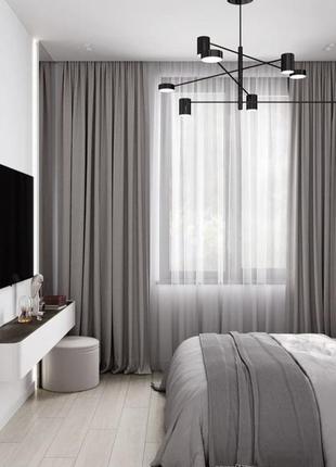 Современная led люстра черного цвета с регулируемыми по оси рожками.