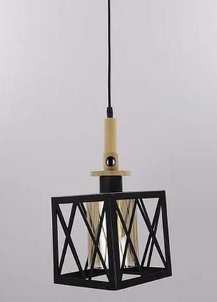 Підвісний світильник з елементами дерева та металу.2 фото