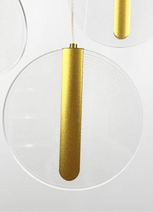 Каскадний світильник зі спадаючими золотими монетками5 фото
