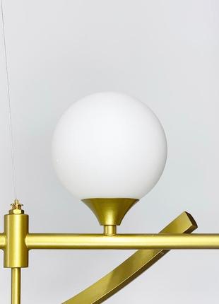 Дизайнерский светильник led в золотистом корпусе.3 фото