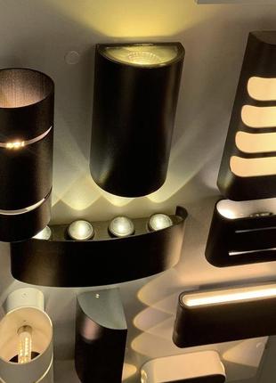 Настінне бра у закругленому корпусі.5 фото