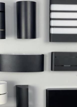 Настінне бра у закругленому корпусі.6 фото