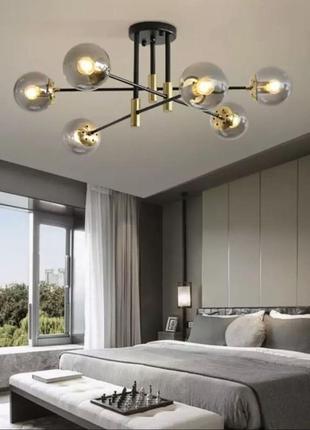 Мінімалістична люстра в корпусі чорного кольору на 6 ламп