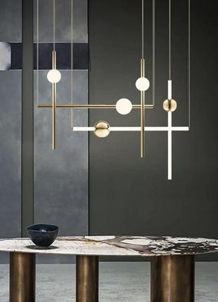 Сучасні підвісні світильники у горизонтальній формі9 фото