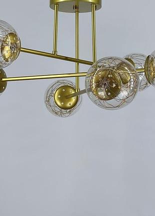 Стельова led люстра на 6 плафонів у золотистому корпусі.3 фото