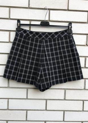 Шорти-спідниця в клітку з кишенями бо боків new look