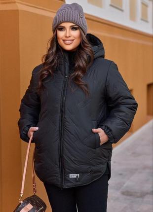 Женская очень теплая стеганая куртка на молнии с округлыми разрезами по бокам размеры 48-627 фото