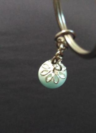 Брелок шарик -(светится в темноте).