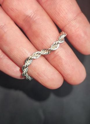 Плетеный браслет серебряного цвета2 фото